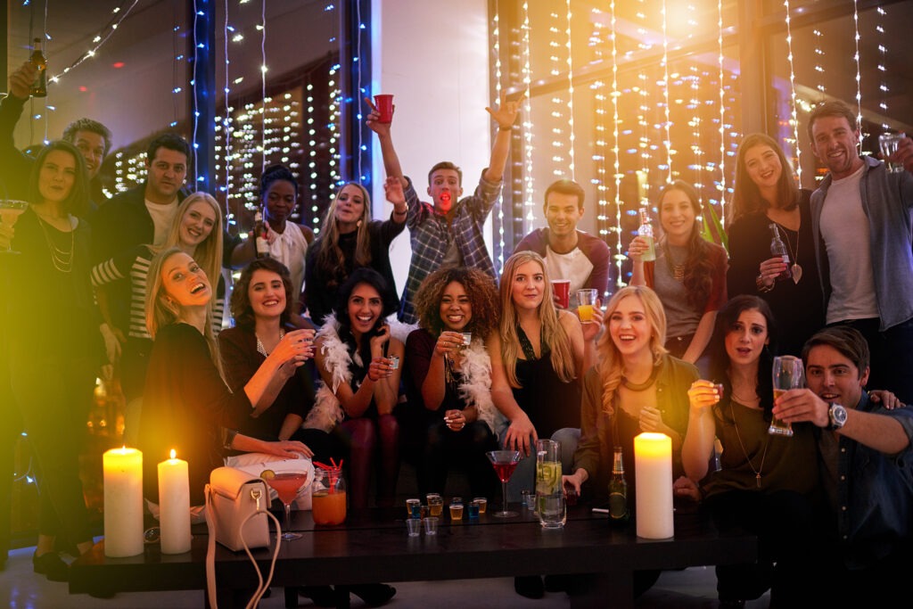 shot of a large group of young people enjoying the 2025 04 06 11 42 35 utc Homev2